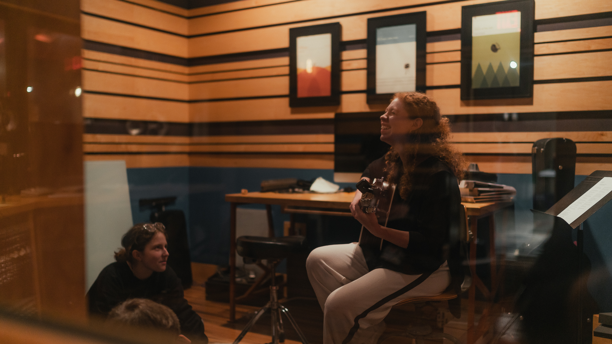 A student concentrates during a one-on-one music lesson